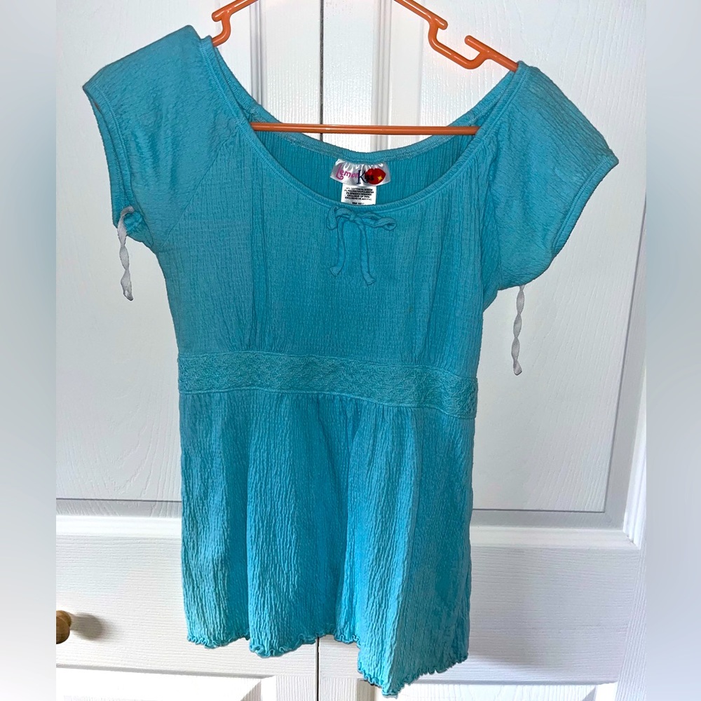 Lemon Kiss size large blue shirt in great used condition.